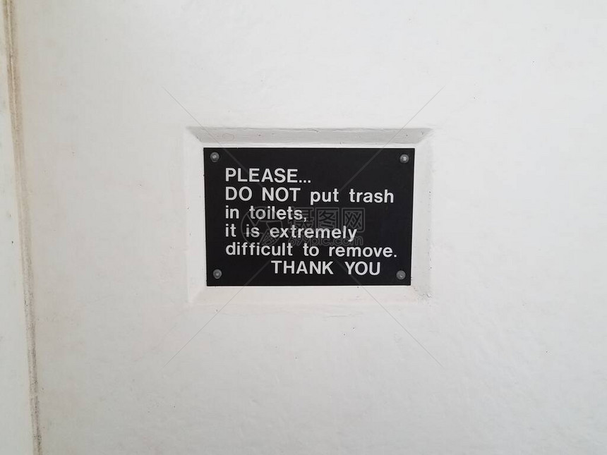 请不要把垃圾倒在厕所里白色墙上的标图片