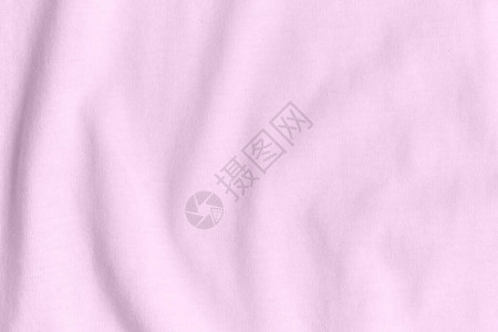 粉红色的丝绸织物作为背景和质地图片