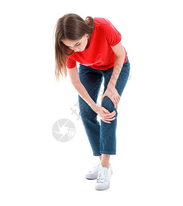 白色背景下膝盖疼痛的年轻女图片
