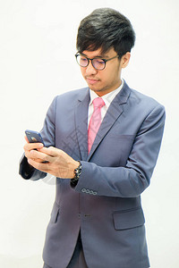 商业的亚裔男子在西装布衣上图片