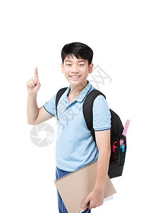 白人背景的学校文具和可爱的亚洲儿童回图片