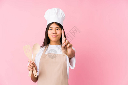 年轻的厨师孤立的年轻厨师女人展图片