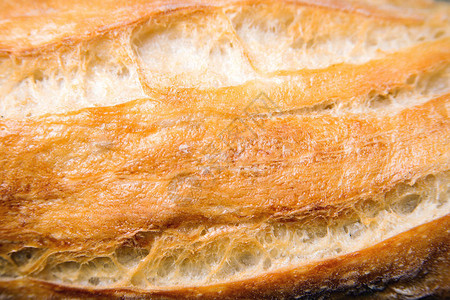 特写法国长棍面包纹理背景新鲜出炉的面包图片