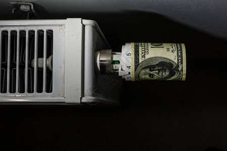 用钱加热自动调温器一美元昂贵的图片