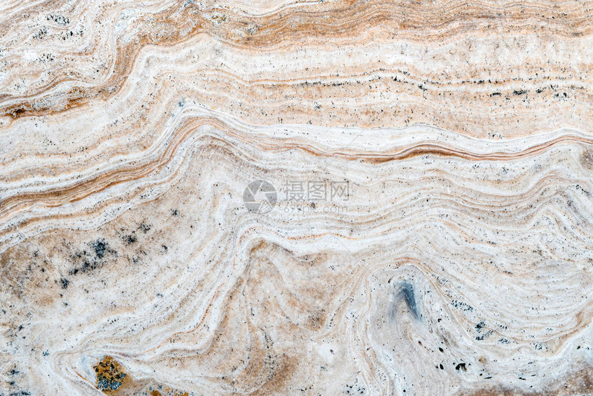 石块白蜜蜂或埃克鲁彩色条纹波形大理石岩石结构坚固耐久等抽象背景的岩图片