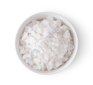 白色背景顶视图上的白色碗中的盐图片