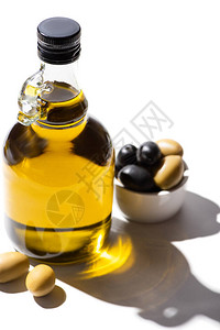 瓶装橄榄油近绿橄榄和黑图片