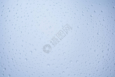 水滴背景玻璃背景上的水滴图片