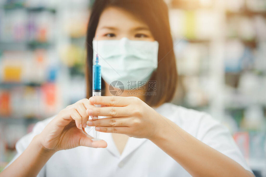 面罩在医院或诊所使用疫苗注射针筒图片