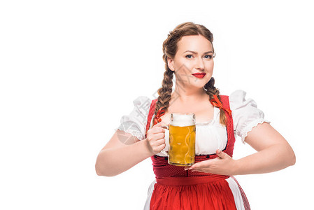 穿着传统的巴伐利亚传统服装的有吸引力的奥托式女服务员图片