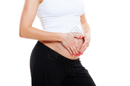 女怀孕的肚子和像心脏一样的手与腹部图片