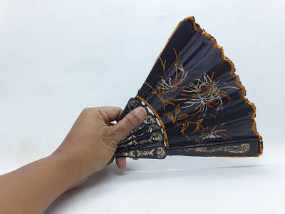 木制竹丝折扇中式日本复古风格手工彩色蜡染图案手扇带织物袖子和流苏家居装饰派对婚设计图片