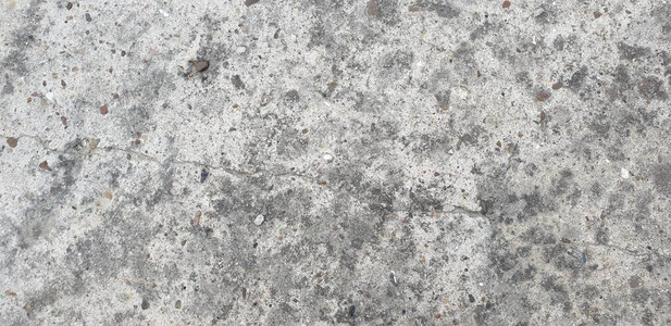 石材表面灰色凹凸不平和苔藓图片