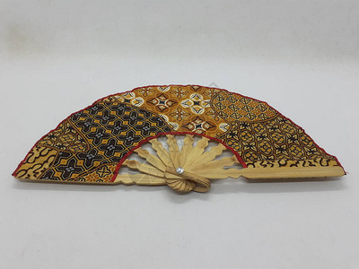 流苏花穗木制竹丝折扇中式日本复古风格手工彩色蜡染图案手扇带织物袖子和流苏家居装饰派对婚设计图片