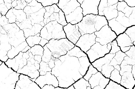 白色干燥和破裂的地面球背景干燥裂隙地面特写纹理上的灰图片