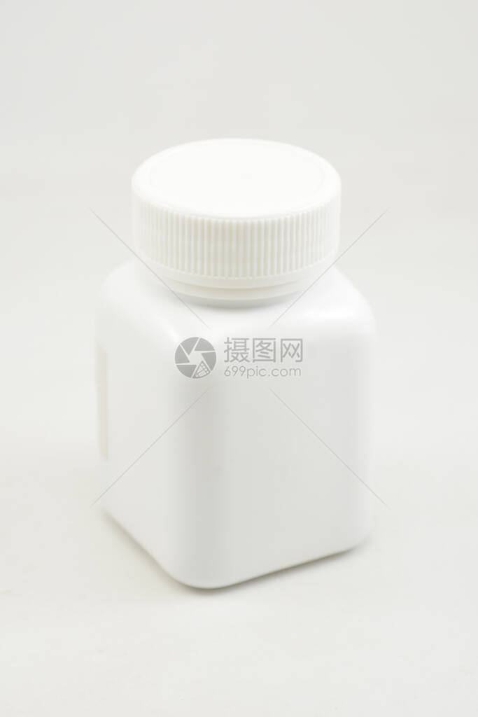 用于放置药片或胶囊的带螺旋盖的白色塑料瓶容器图片
