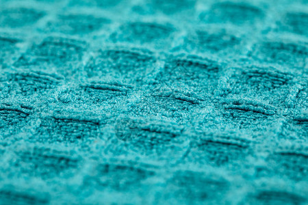 蓝色棉布纺织品织物纹理的封闭图片