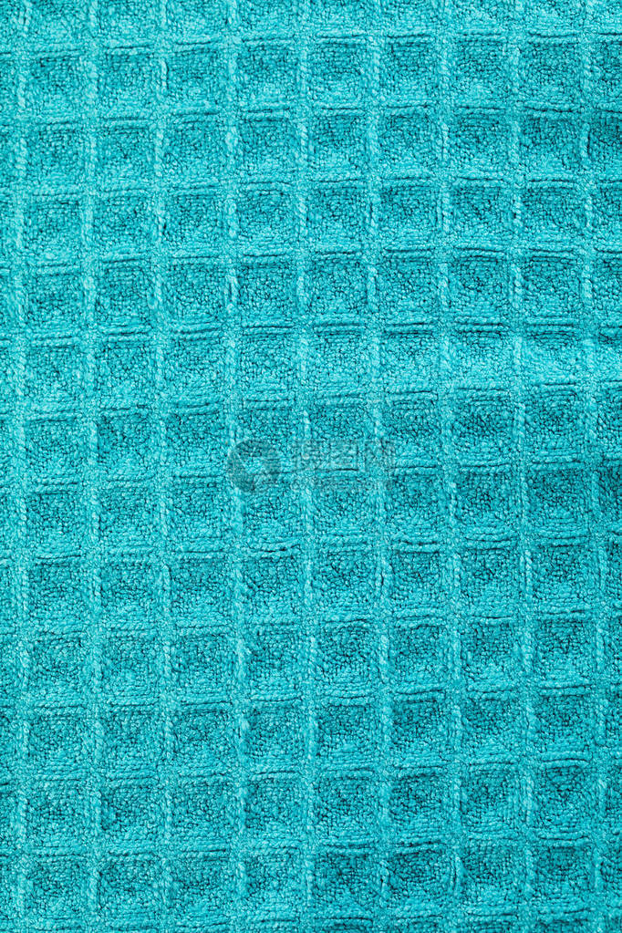 蓝色棉布纺织品织物纹理的封闭图片