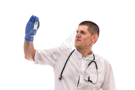 身戴手套的医生手持带有白单片图片