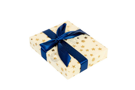 圣诞节或其他节日手工制作的礼物在金纸与蓝丝带图片