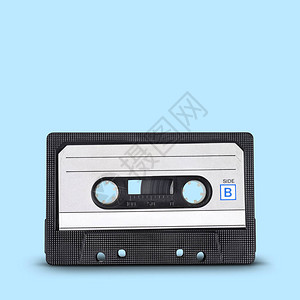 录音蓝色背景上的旧磁带紧凑盒式磁带图片
