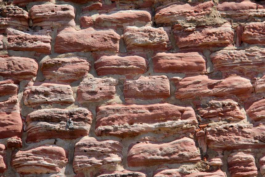 砂岩墙由天然石头制成图片