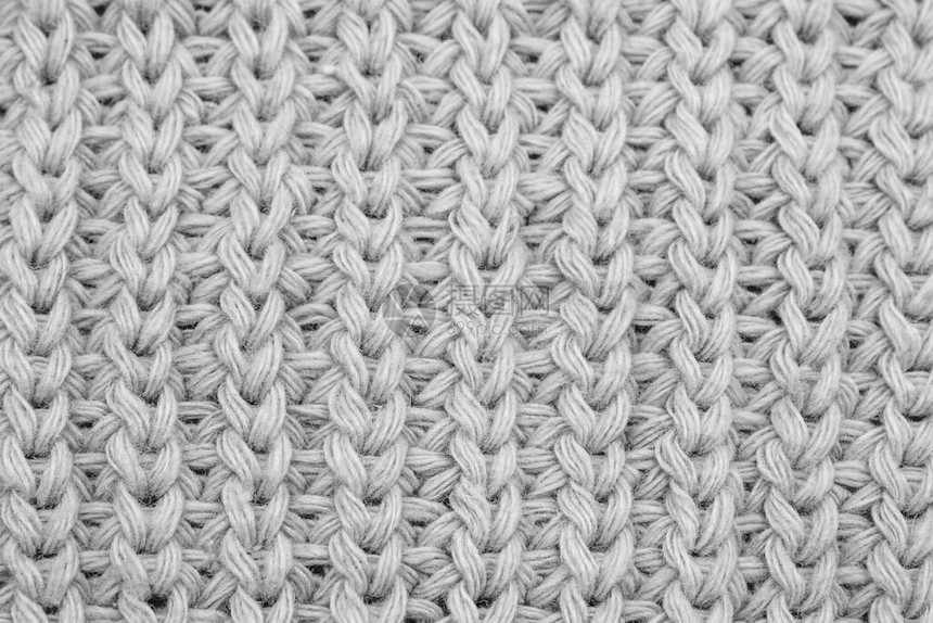 针织毛衣特写的质地白色针织羊毛图片