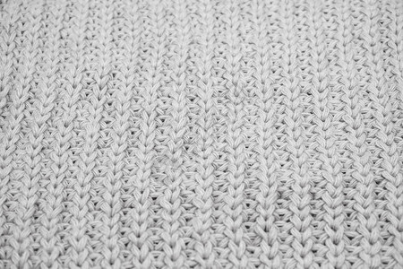 针织毛衣特写的质地白色针织羊毛图片