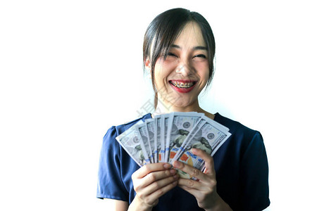 带着钱的亚洲微笑的女人图片
