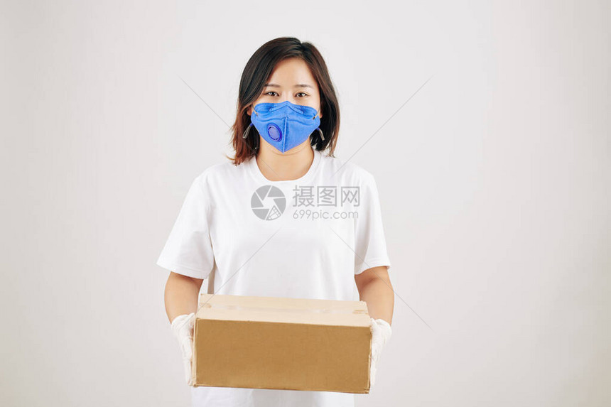 身戴医疗面具和橡胶手套纸箱内橡皮手套的亚洲漂亮图片