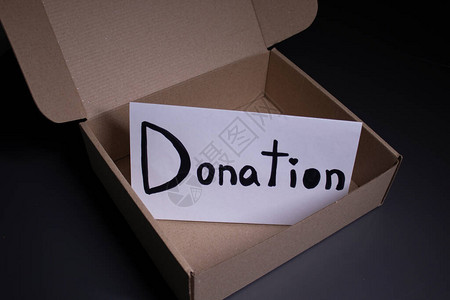 以黑字母在框中手写的捐赠符号捐赠概念Corona大流行背景图片