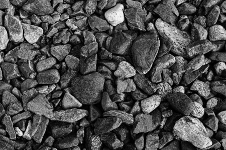 黑色小路石背景深色砾石鹅卵石纹理花背景图片