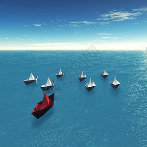 在海洋上组纸船红纸船在多艘船的前图片