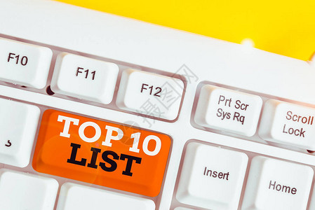 手写文本前10名列表概念照片显示特定列表中最重要的或成功的十大项目Whitepc键盘背景图片