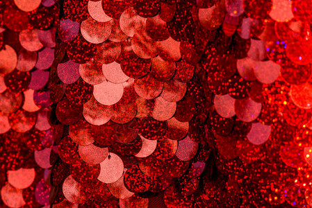 串珠绳红色亮片图案闪发光的亮片背景背景的红色亮片织物长方形红色闪亮面料与亮片设计图片