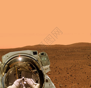 太空人在行星火上行走这个图像的元素由美图片