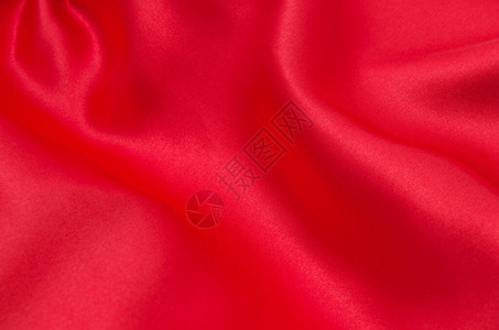 作为背景的红色缎子或丝绸织物图片