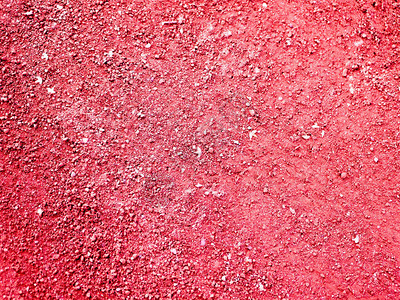 红色沙子紧贴沙质橙色运动车用石块图片
