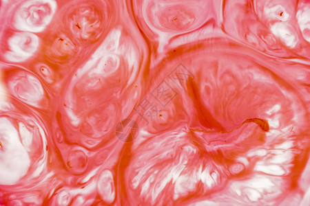 丙烯酸的特写镜头抽象颜色混合用作背景具有大理石图案红色大理石背景图片