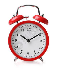 红色复古圆形闹钟的特写镜头古董打盹点十分钟到十一点提醒和时间唤醒概念在白背景图片