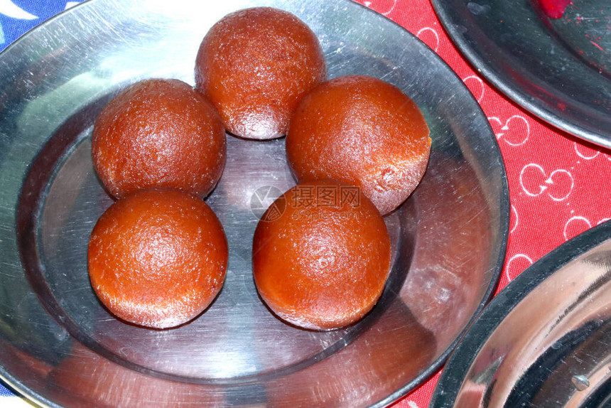 SweetGulabJamun流行的印度甜点或甜圈图片