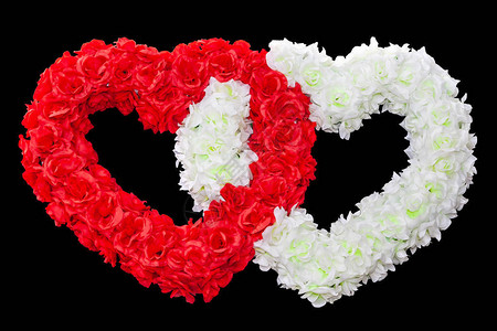两颗红心和白花两颗爱心被黑色隔离图片