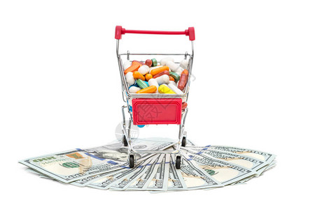 完整的购物车与药丸在白色背景上的美元钞票图片