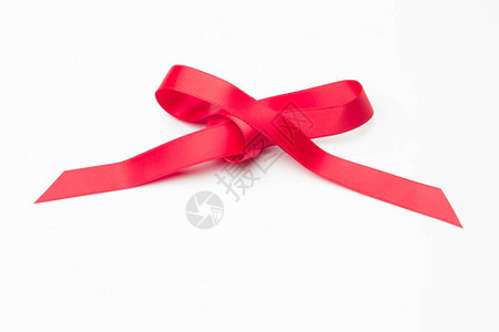 红丝带在圣诞礼物生日礼物周年纪念日一般礼物中制作装饰领带背景图片