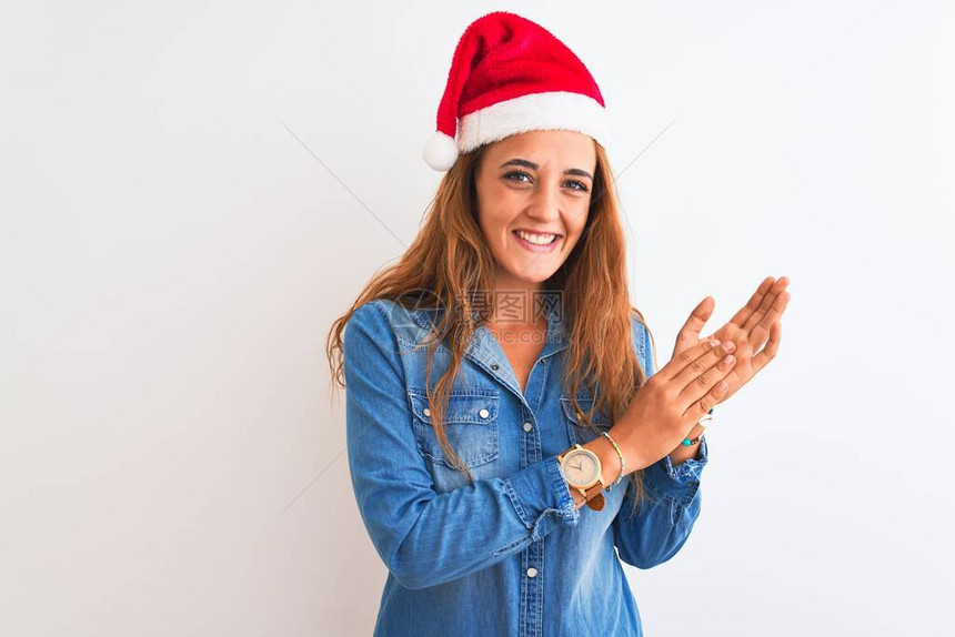 身戴圣诞帽的年轻美女红发女青年图片
