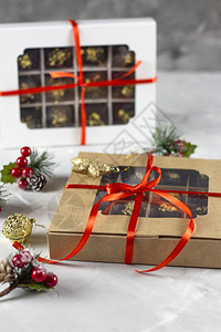 弗拉特利圣诞节和圣诞节圣诞贺卡巧克力礼物从上面平铺的圣诞主图片