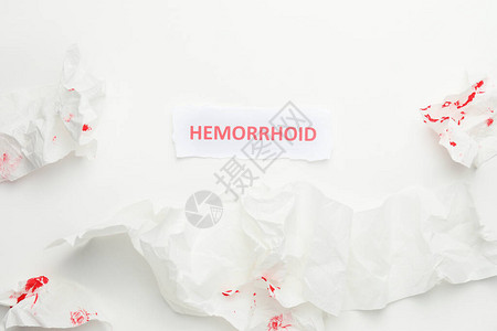 带血迹和光背景HEMORHOID图片