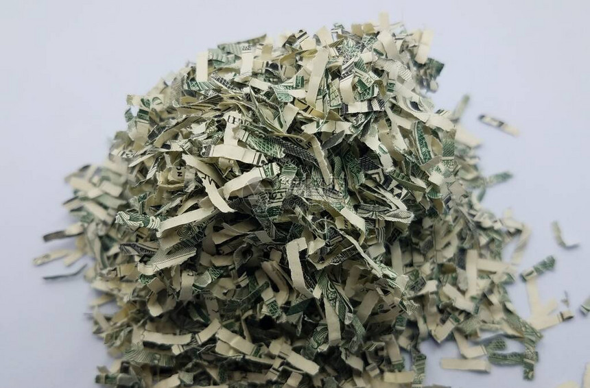 一堆碎美国钱或美元钞票图片