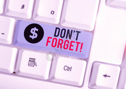 写笔记显示DonTForget用于提醒某人重要事实或细节的商业概念白色pc键盘背景图片