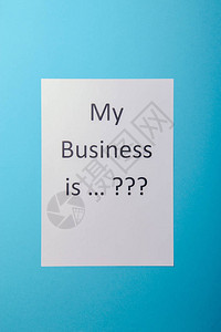 我的生意是词的概念蓝色背景上带有商业文件纸的商业词对于商业图片
